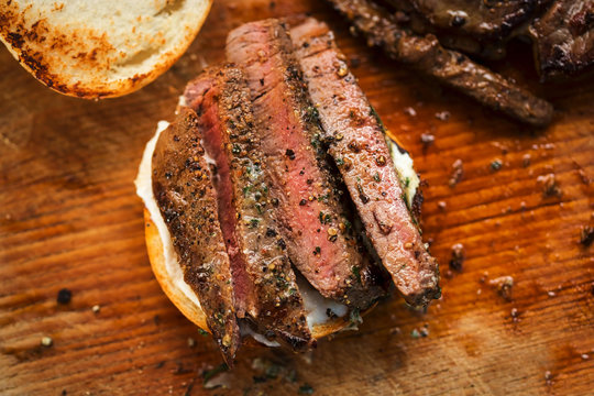 Sliced Angus Steak Served On Bun With Horseradish Sauce 