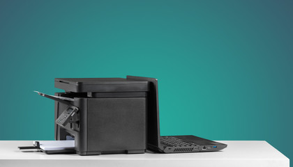 Printer copier machine on a bright colored background