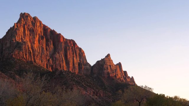 A Red Rocks Of The Zion Park Are Bathed In Sun At Sunset