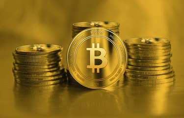 Bitcoin closeup. Cryptocurrency. Golden coins on background. Finance and banking concept.