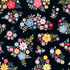 Lovely ditsy floral pattern with cute abstract flowers in vector. Seamless background with colorful bouquets. Vector illustration. Fashion print for fabric.