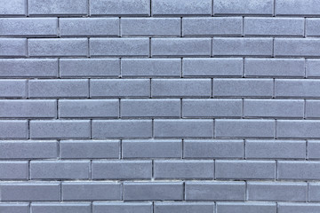 Texture of a wall from a gray brick