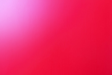 texture of a metal surface painted with bright red paint with a gradient angle