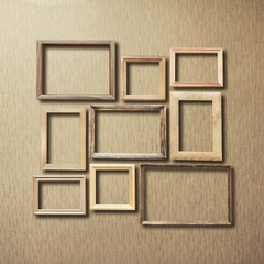 Fototapeta premium old photo frames on retro wallpaper