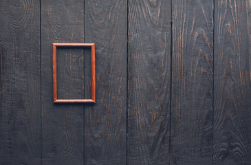 photo frame on old wooden wall