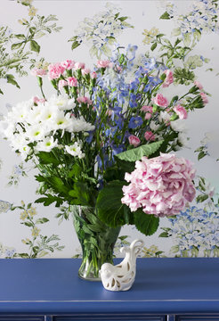 Bouquet Of Summer Flowers In The Style Of Provence On Blue Dresser