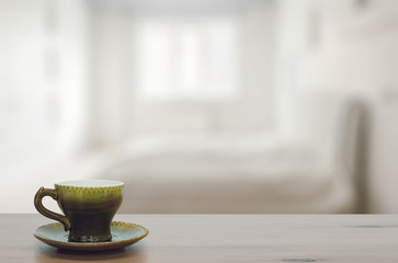 cup on wooden table