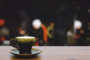 green cup on the table