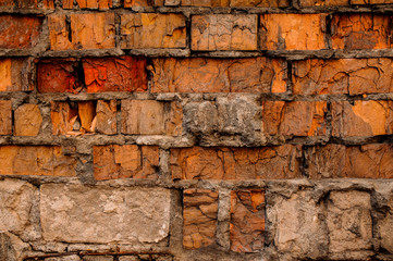 Cracked concrete vintage old brick wall background