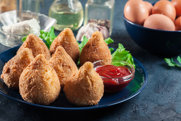 Coxinha. Fried croquette with chicken