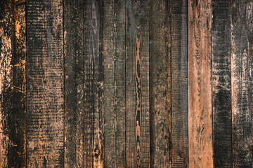The surface is of the worn wooden boards