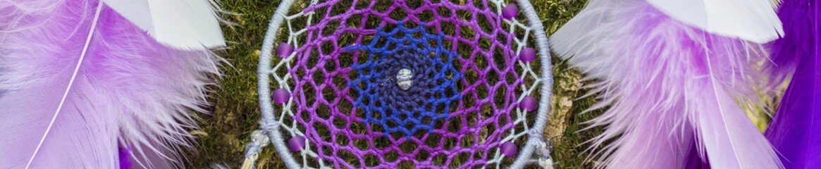 Banner of Dreamcatcher made of feathers, leather, beads, and ropes