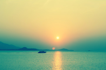 Fototapeta na wymiar sunset at sea peaceful and fresh summer nature background