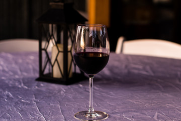 Wine Glass and Lantern on Fancy Table