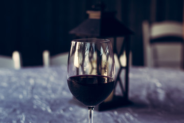Wine Glass and Lantern on Fancy Table