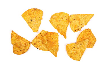 Naklejka premium Chili flavored tortilla chips pile isolated on white background, top view