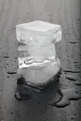 ice cubes on black table background.
