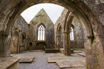 Fototapeta na wymiar Landscapes of Ireland. Ruins of Friary of Ross in Galway county