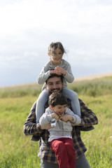 Father and daughter playing outdoors