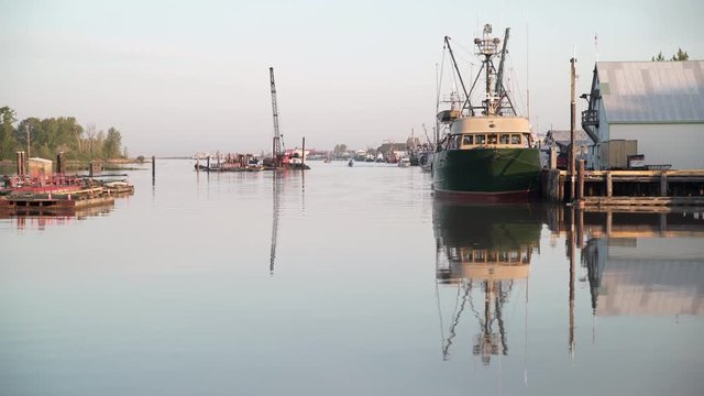 Steveston Harbor Fish Boats 4K UHD. Fishing boats moored in Steveston, British Columbia. Canada near Vancouver. 4K UHD.
