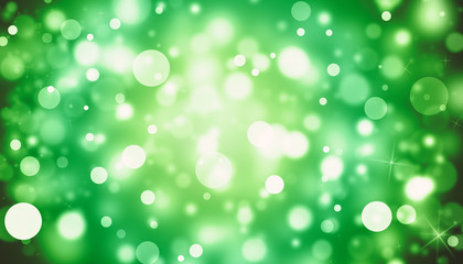 Green glitter sparkles rays lights bokeh Festive Elegant abstract background.