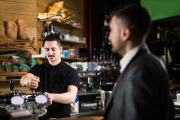 Male barista and his friend