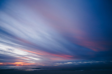 An amazing sunset on the coast at the ocean