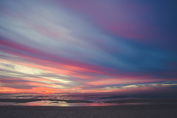 An amazing sunset on the coast at the ocean
