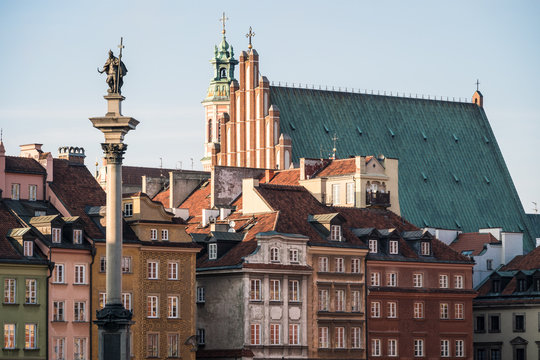 Warsaw old town by Zamkowy square with the cathedral in Poland capital city on a sunny day