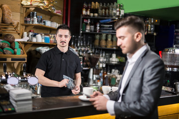 Caffe guest and barista