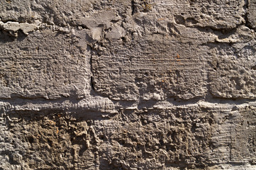 Concrete blocks of gray color, a fragment of the wall, an element for the texture or background.