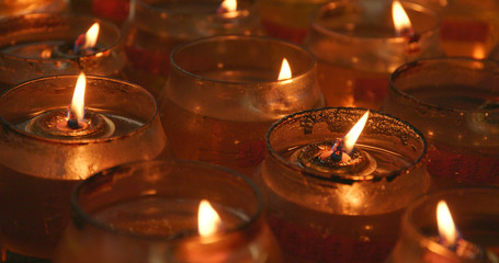 Candle light burning inside Man mo temple