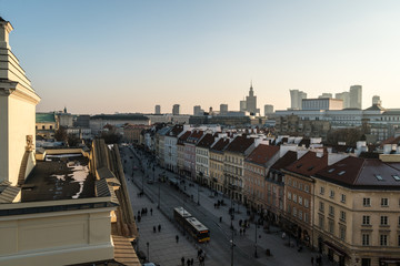 Sunset over Warsaw old town and the financial district tower in the background with the Palace of culture and science in Poland capital city