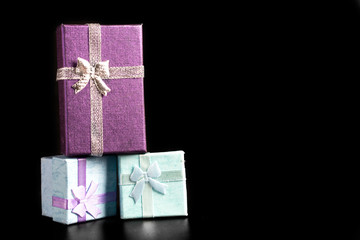 Gift packaging on a black background.