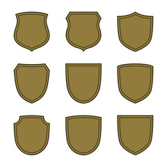 Shield shape bronze icons set. Simple silhouette flat logo on white background. Symbol of security, protection, safety, strong. Element for secure protect design emblem. Vector illustration