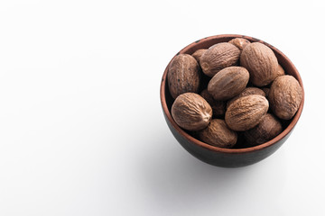 aromatic nutmeg on a white acrylic background