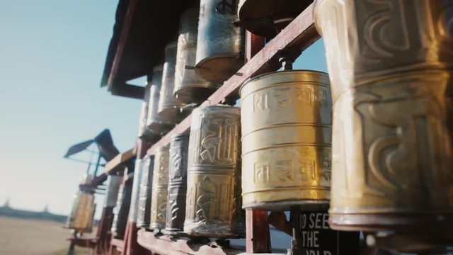 Spinning Buddhist prayer drums at a monastery in Mongolia.