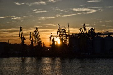 Fototapeta na wymiar Cargo port at sunset, industry