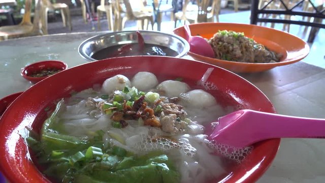 hot noodle soup on table at Malaysia local restaurant