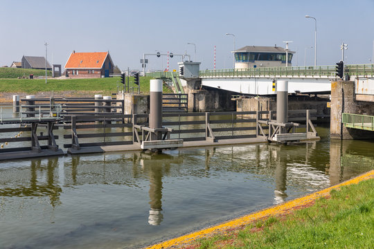 Bridge and sluice in Afsluitdijk near Kornwerderzand in the Netherlands. This is the seperation of the salt Wadden Sea and the fresh water lake IJsselmeer
