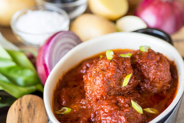 Juicy Meatballs with Tomato Sauce and Ingredients for Cooking