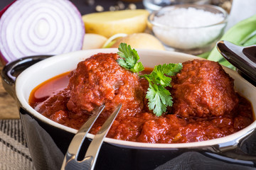 Juicy Meatballs with Tomato Sauce and Ingredients for Cooking