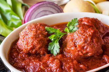 Juicy Meatballs with Tomato Sauce and Ingredients for Cooking