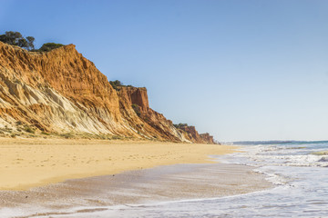 Fototapeta na wymiar Beautiful Falesia beach with high cliffs by Atlantic Ocean, Albufeira, Algarve