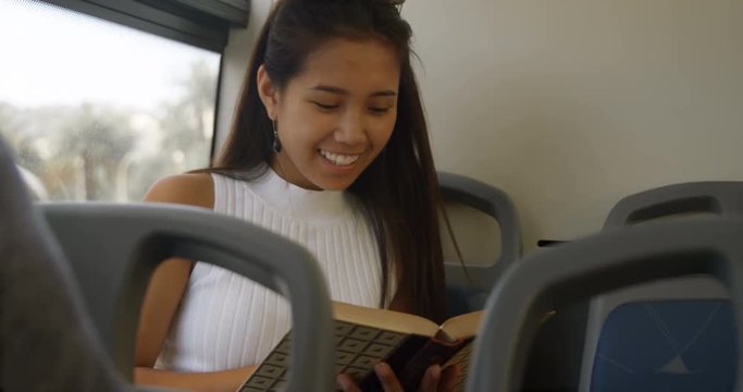 Teenage girl reading a book 