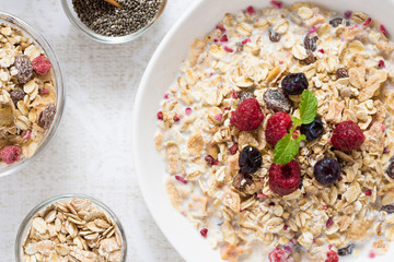 Muesli With Milk, Chia Seeds, Berries and Cinnamon with Freshly Squeezed Orange Juice