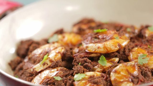 Spicy prawn shrimp stew on a pan