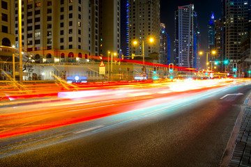 City road night scene, UAE, Dubai, Night traffic long tracers in Dubai UAE center