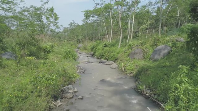 Nature beauty of small river in rain forest, Ledok Sambi village, Yogyakarta, Indonesia. April 2018
