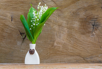 lilies of the valley in a vase